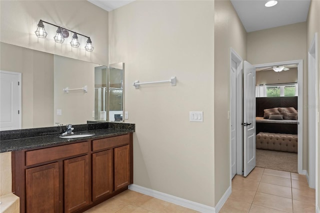 bathroom featuring tile patterned floors and vanity