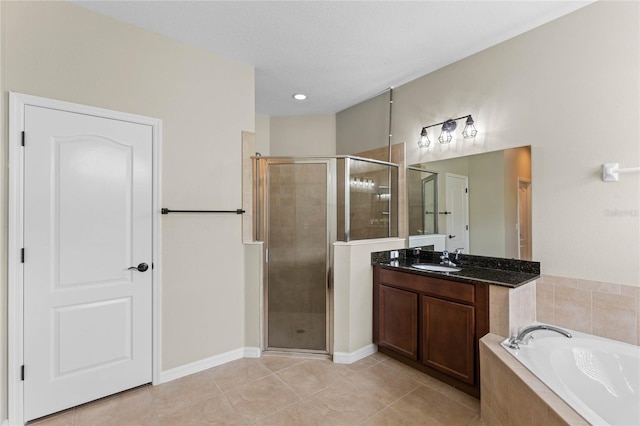 bathroom with separate shower and tub, tile patterned flooring, and vanity