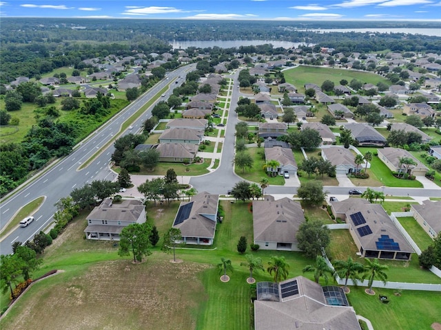 drone / aerial view with a water view