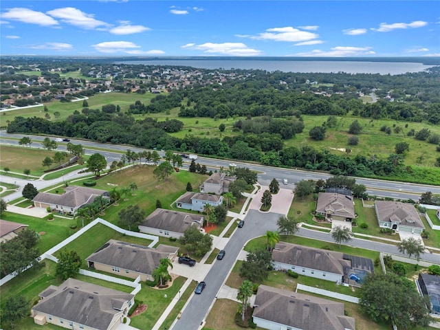 drone / aerial view with a water view