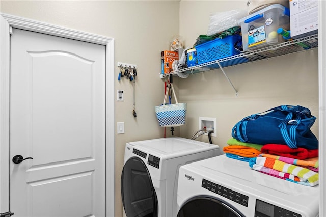 laundry room with washer and dryer