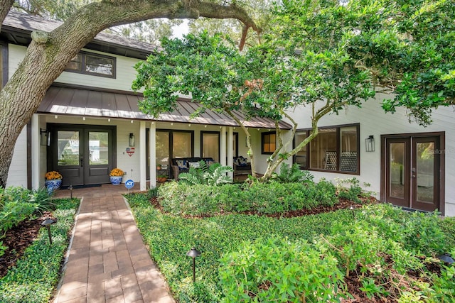 entrance to property featuring french doors