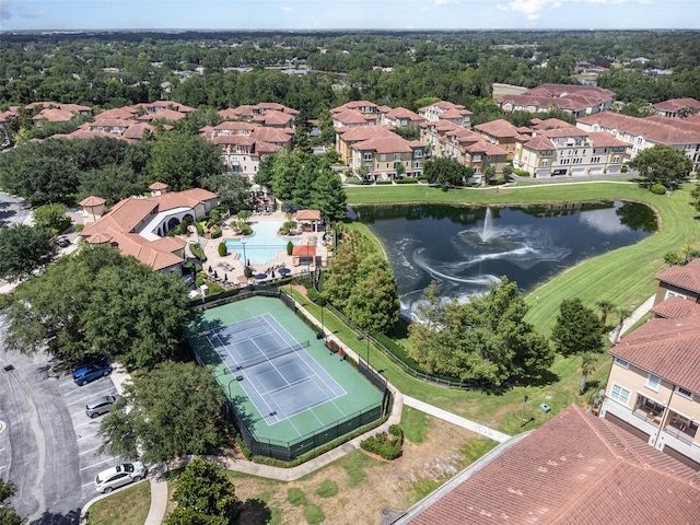 birds eye view of property featuring a water view and a residential view