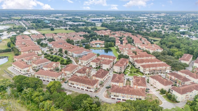 aerial view featuring a water view and a residential view