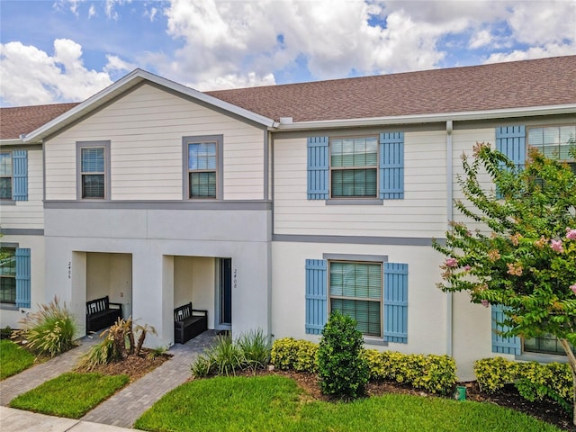 view of property with stucco siding