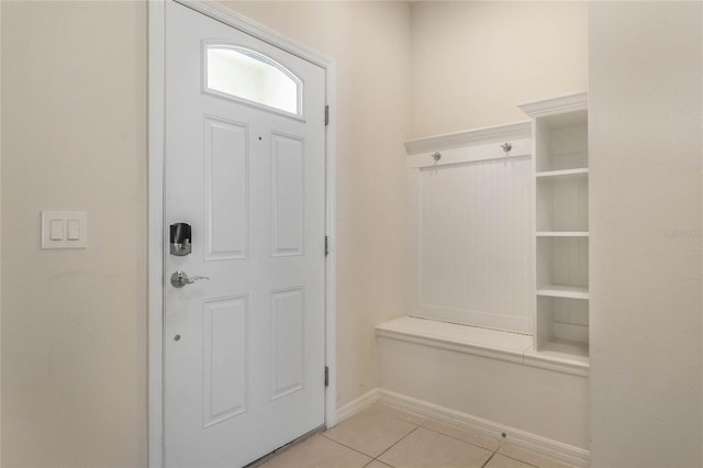 mudroom with light tile patterned flooring