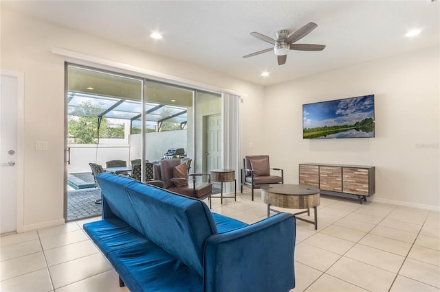 tiled living room featuring ceiling fan