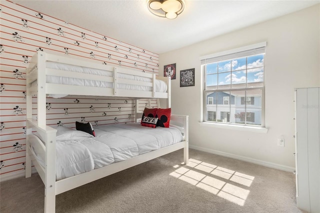 bedroom featuring light carpet