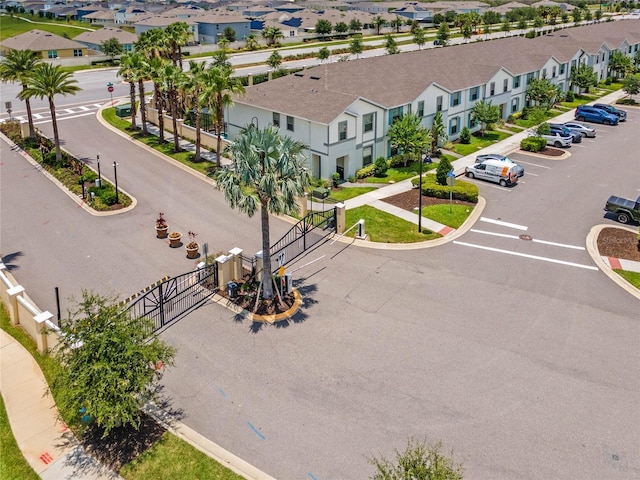 birds eye view of property with a residential view