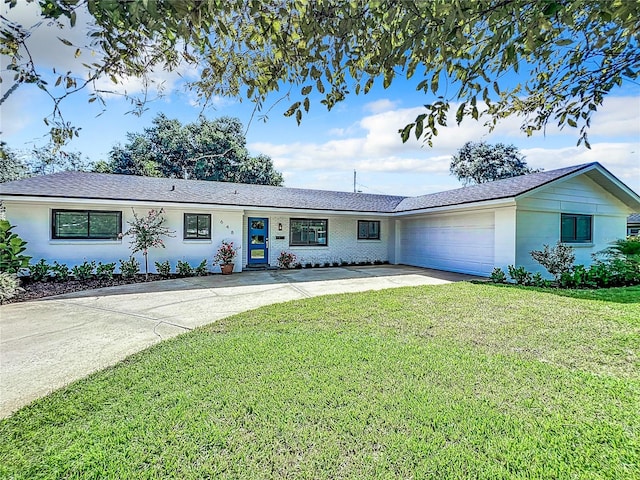 single story home with a front lawn and a garage