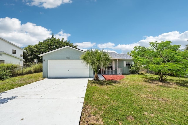 ranch-style home featuring a front lawn, a garage, and a porch