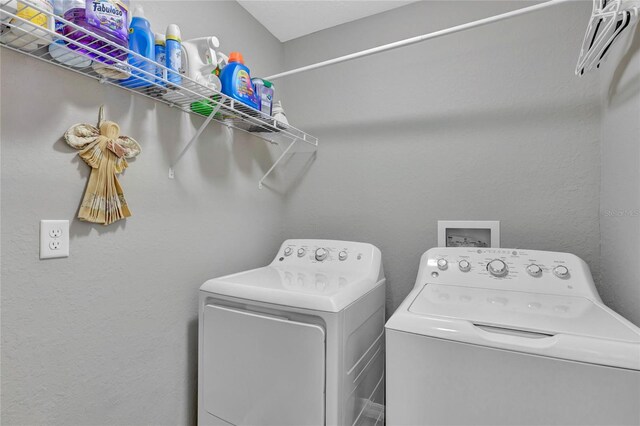 laundry area featuring washing machine and dryer