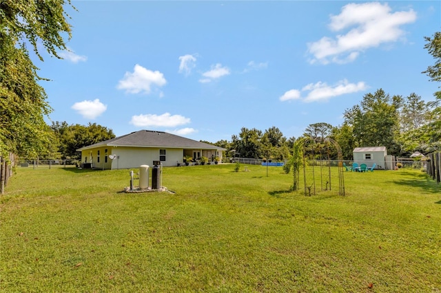 view of yard with a shed