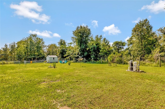 10604 SE 146th Ln, Summerfield, FL 34491 - view of yard with an outbuilding, fence, and a shed