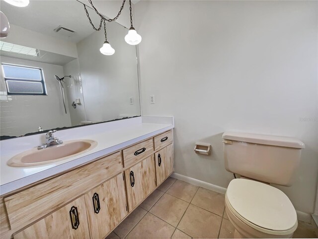 full bath with tile patterned flooring, toilet, visible vents, vanity, and a shower