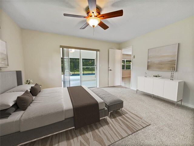 bedroom with ceiling fan, access to outside, carpet, and baseboards