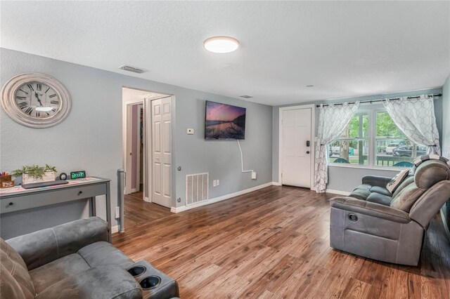 living room featuring hardwood / wood-style floors