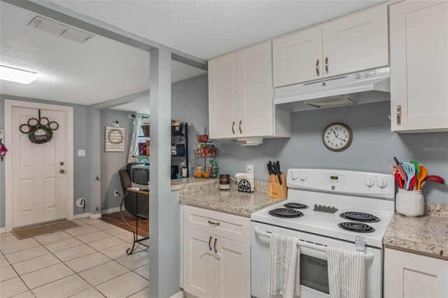 kitchen featuring white electric stove, a textured ceiling, and white cabinets