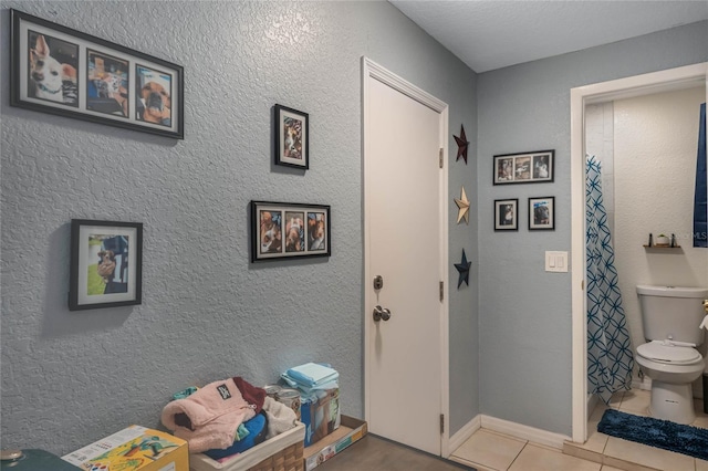 foyer entrance featuring tile patterned flooring