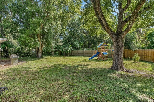 view of yard with a playground