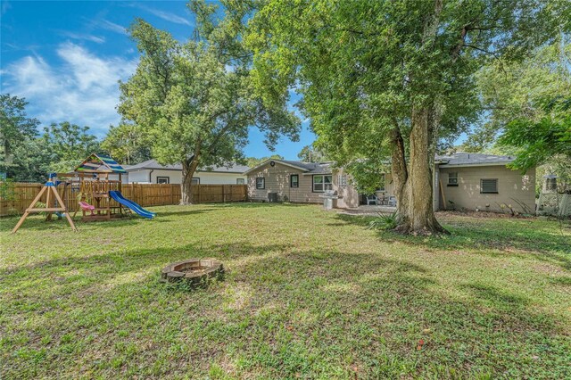 view of yard with a playground