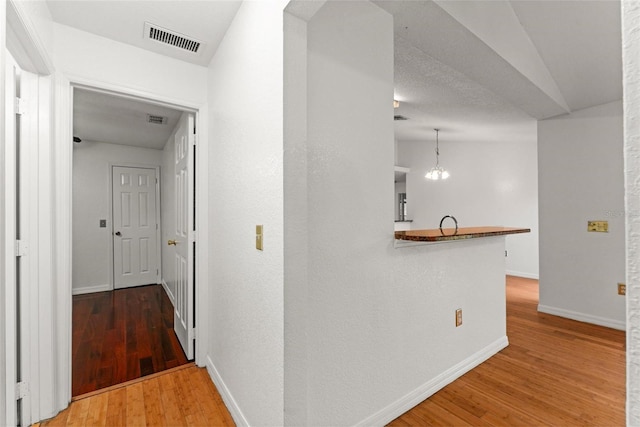 hall featuring hardwood / wood-style floors