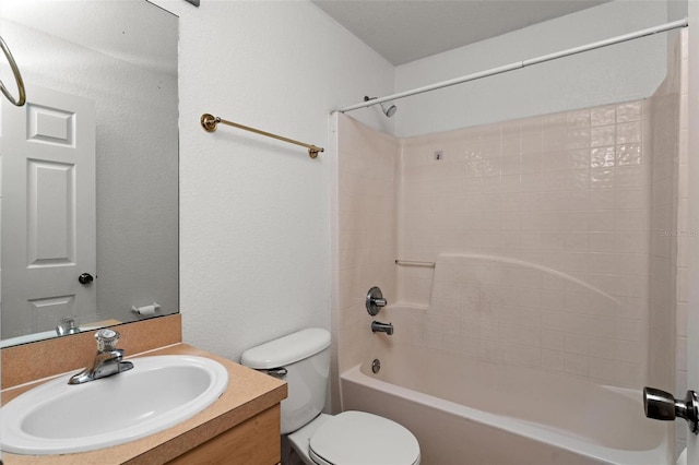 full bathroom featuring toilet, shower / bathing tub combination, and vanity