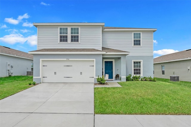 front of property with cooling unit, a garage, and a front yard