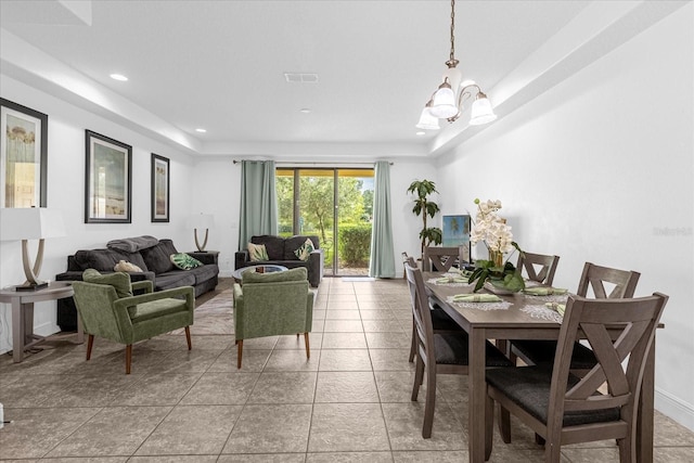 8110 Roseville Rd, Davenport, FL 33896 - dining space featuring visible vents, recessed lighting, light tile patterned floors, baseboards, and a chandelier