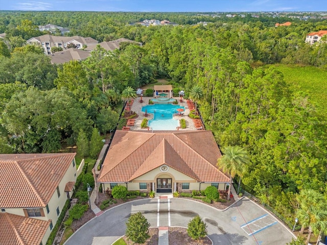8110 Roseville Rd, Davenport, FL 33896 - aerial view with a wooded view
