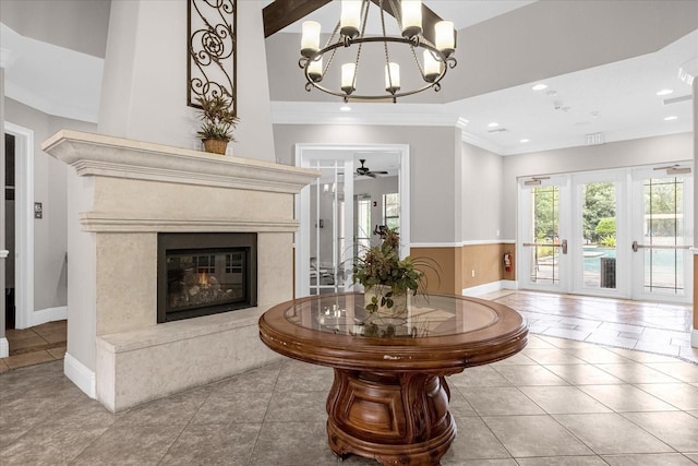 8110 Roseville Rd, Davenport, FL 33896 - living area with a high end fireplace, recessed lighting, tile patterned floors, and an inviting chandelier