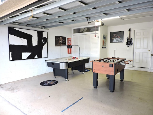 recreation room featuring a garage