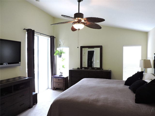 320 Henley Cir, Davenport, FL 33896 - bedroom featuring lofted ceiling, light carpet, access to outside, and ceiling fan