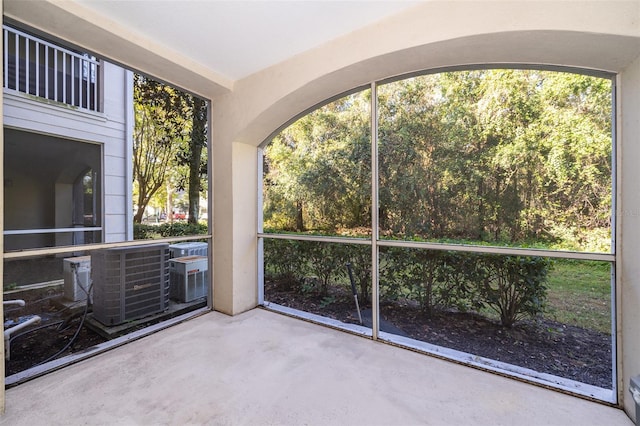 unfurnished sunroom with a wealth of natural light