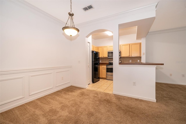 carpeted empty room featuring crown molding