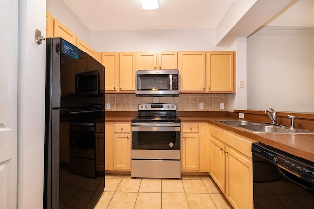 kitchen with backsplash, sink, light brown cabinets, and black appliances