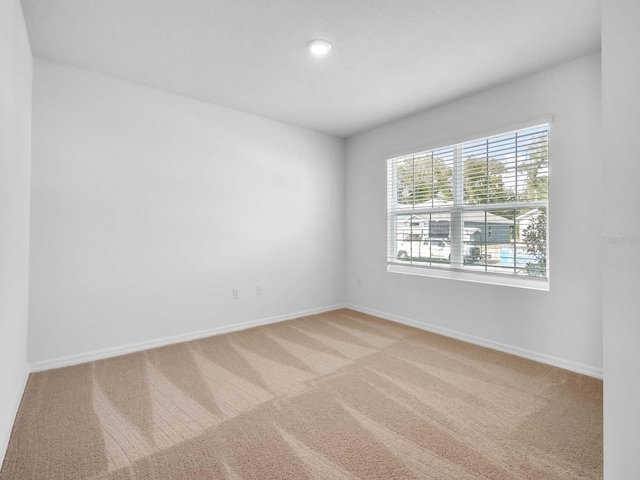 empty room with light carpet