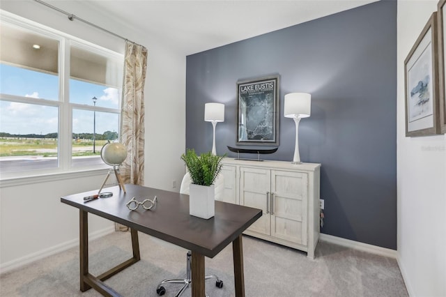 home office featuring light colored carpet