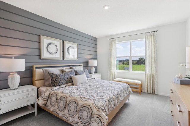 bedroom with light colored carpet