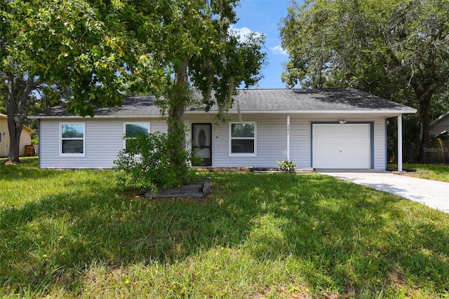 single story home featuring a garage and a front yard