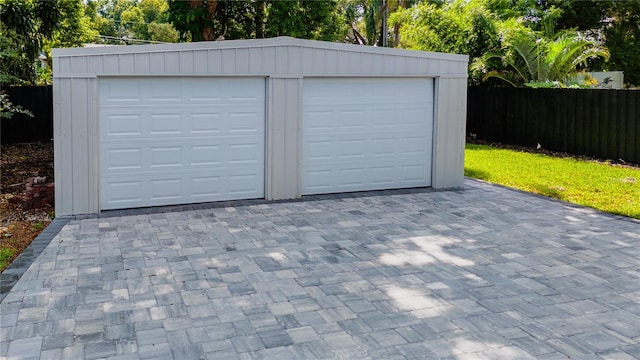 detached garage with fence