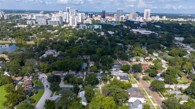 bird's eye view featuring a view of city and a water view