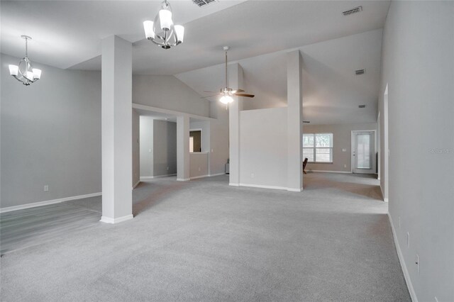 unfurnished living room with high vaulted ceiling, ceiling fan with notable chandelier, and light colored carpet