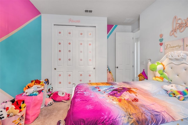 bedroom with carpet floors and a closet