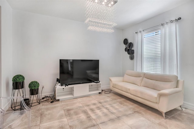 living room with an inviting chandelier