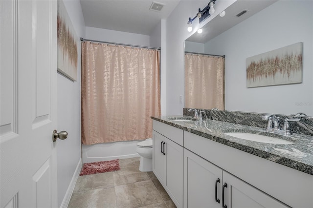 full bathroom featuring toilet, vanity, shower / tub combo with curtain, and tile patterned flooring