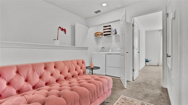 interior space featuring carpet floors, washer and dryer, visible vents, and recessed lighting