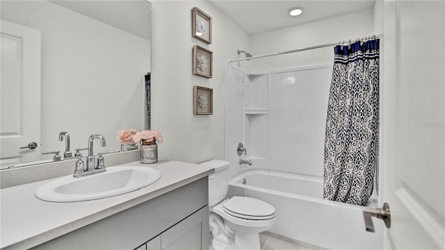 full bathroom featuring toilet, shower / bath combo, tile patterned flooring, and vanity