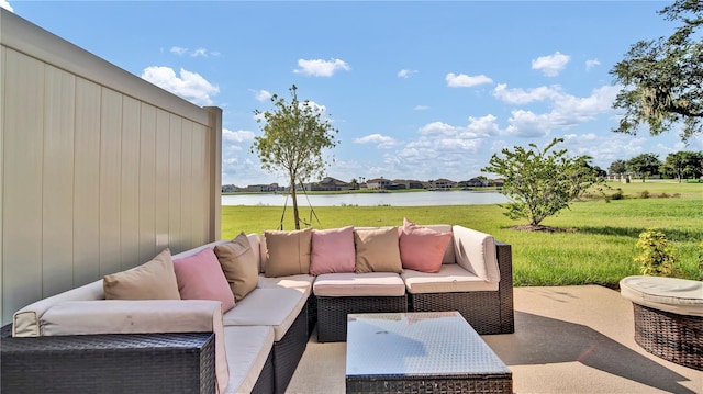 view of patio featuring outdoor lounge area and a water view