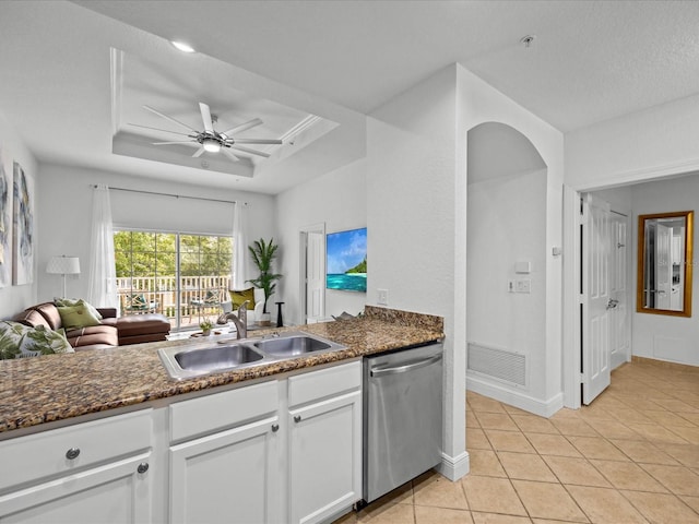 kitchen featuring white cabinetry, dishwasher, sink, ceiling fan, and light tile patterned floors